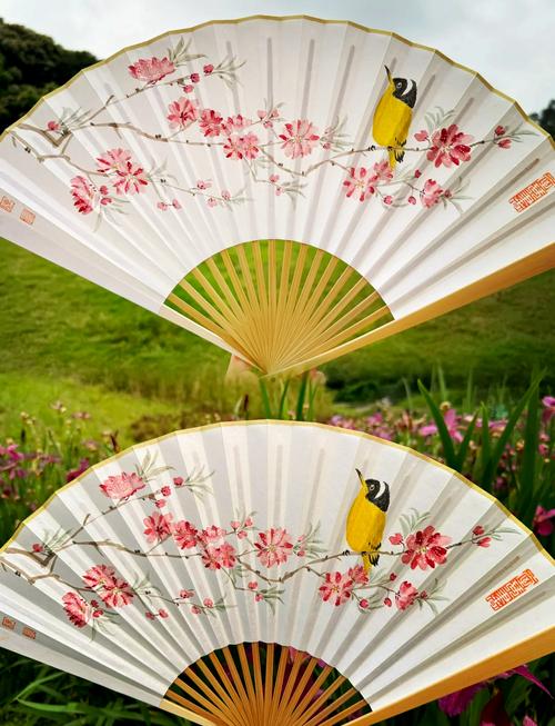 扇子有桃花风水讲究，这种搭配是否真的有特别的寓意或影响？